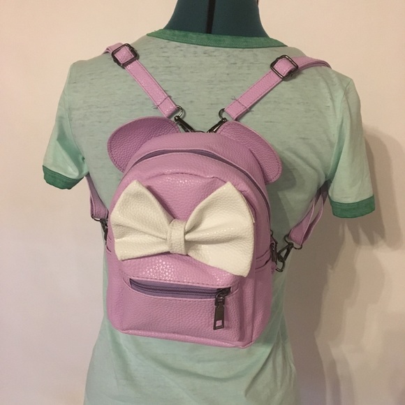 Handbags - NWOT PURPLE AND WHITE MINNIE MOUSE MINI BACKPACK